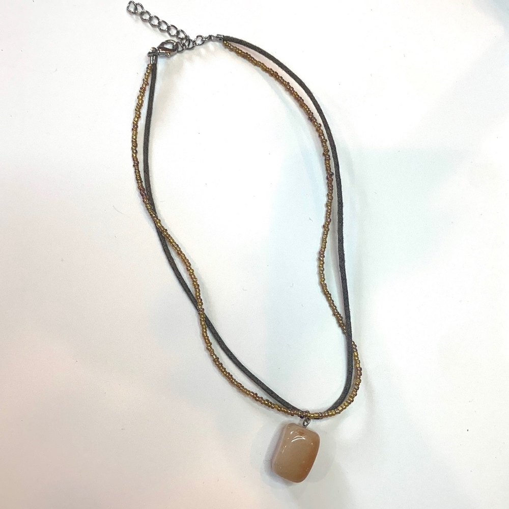 necklace with semi precious stone charm